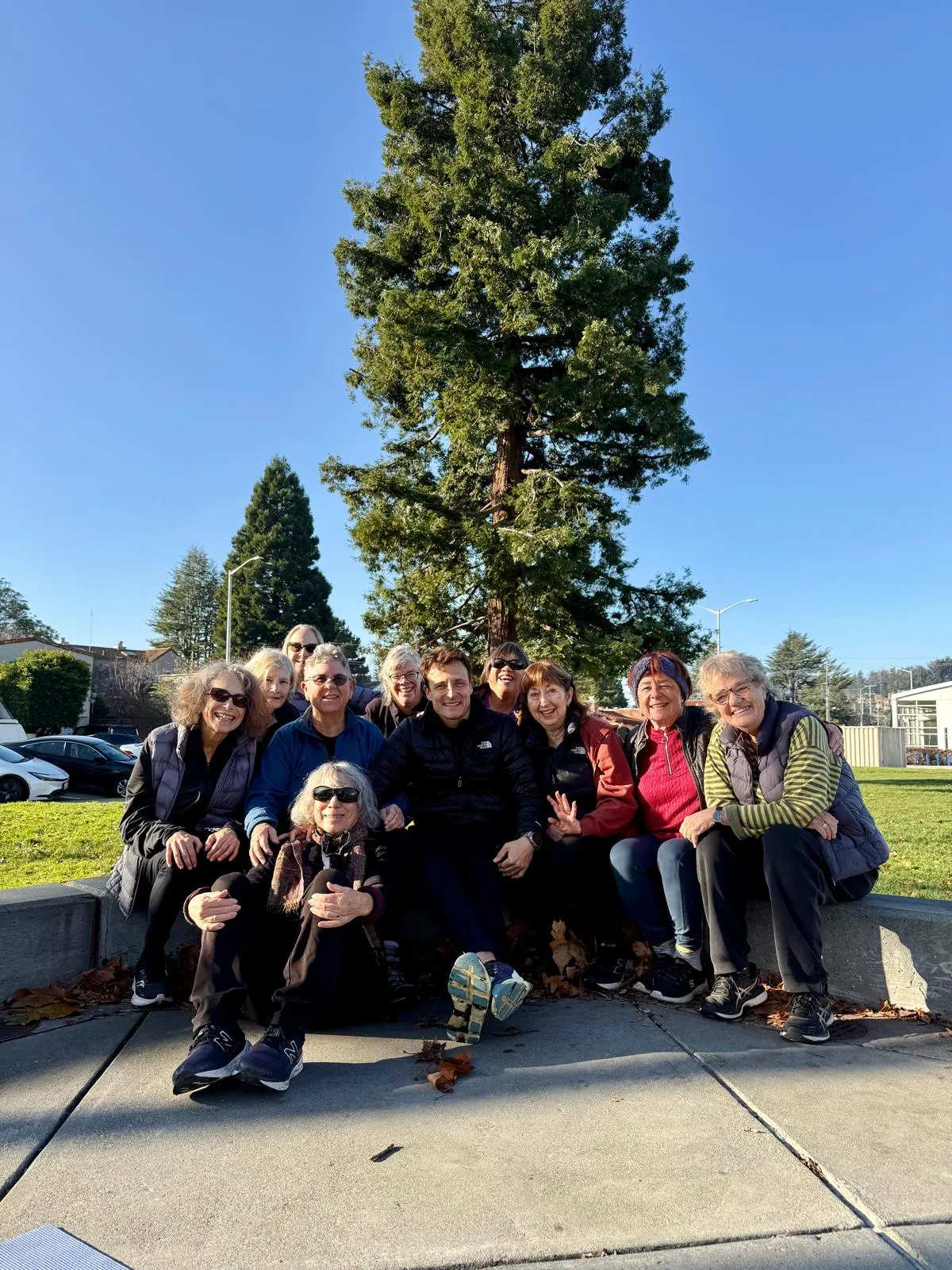 Dario with senior fitness group outdoors